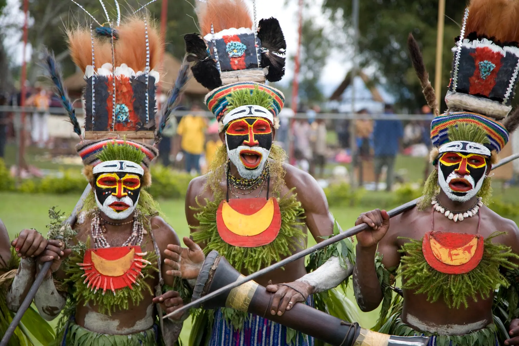 Papua New Guinea — Goroka Show sing-sing performers in ceremonial face paint and feather headdresses